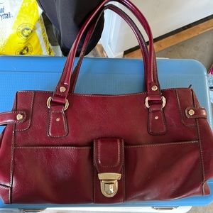 Red Liz Claiborne. Small bag. Wear on bottom